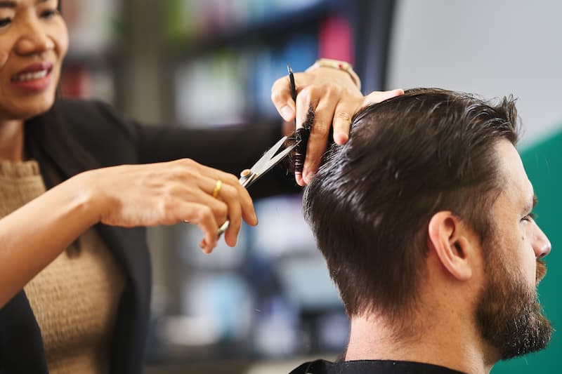 Man getting his hair cut by a Great Clips stylist